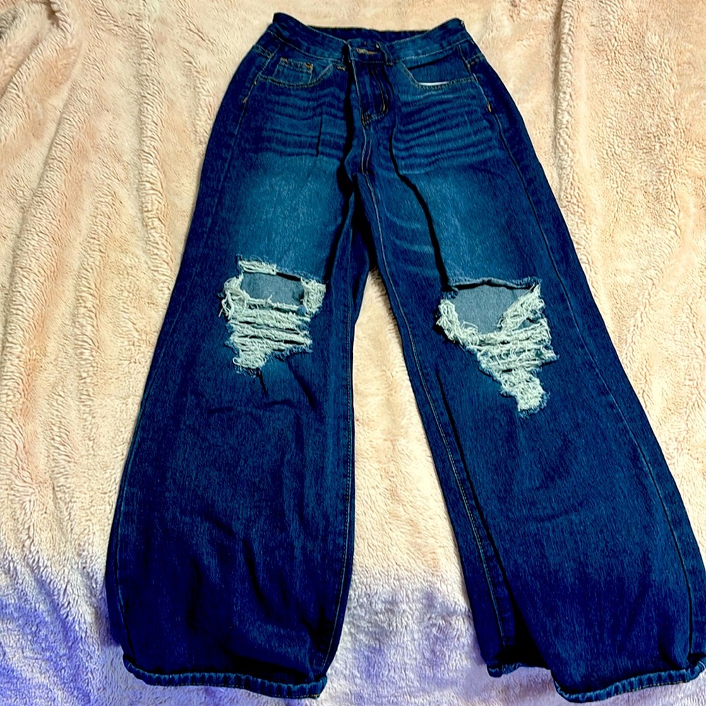 Very rich, blue baggy pants.